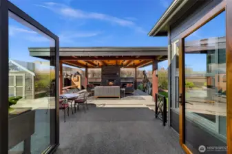 Open a single side of these incredible glass doors - or use both sides accordion style and open your entire living space into the custom built outdoor living