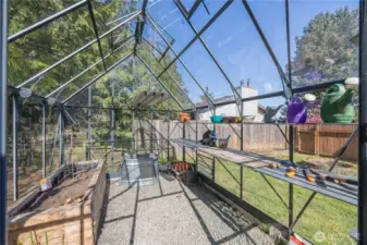 Glass greenhouse with outlet.