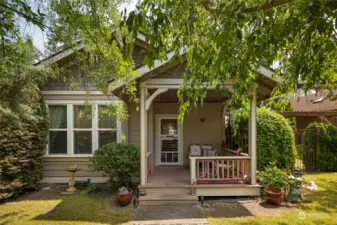 A covered porch welcomes you home.