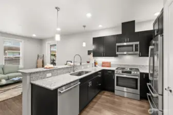 Gourmet kitchen with quartz countertops, Bosch appliances, and soft-close cabinetry.