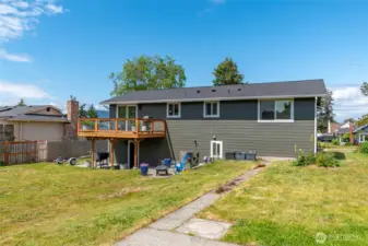 The exterior boasts brand-new Hardie Plank siding, fresh paint, a new roof, an inviting deck, and windows throughout—combining durability with curb appeal.