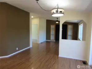 FAMILY ROOM W/ 2 MORE BEDROOMS AND MAIN BATH TO LEFT.