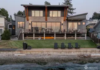 Beachside w/generous deck and yard to enjoy the outdoor living spaces