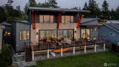 Beachside w/generous deck and yard to enjoy the outdoor living spaces