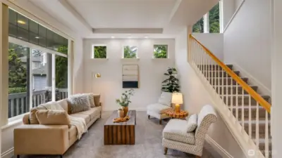 Enjoy elegant finishes throughout this home with walls of windows, strategically placed lighting and tray ceilings in this room.