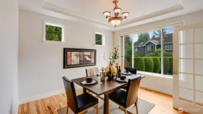 This dining room is perfect for quiet dinners spent at home or entertaining with direct access to the kitchen for easy serving.