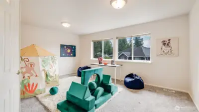 This versatile room can easily serve as a guest bedroom, playroom, home office, or whatever fits your lifestyle needs!