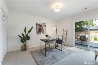 Bedroom #4 with access to back yard