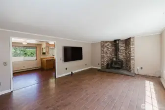living room looking into dining area and kitchen.