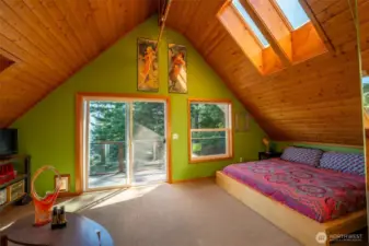 Master Bedroom with sliding doors leading to deck.