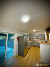 house kitchen and sliding glass door to yard