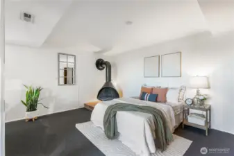 Garden Level bedroom (11’-6” x 17’-0”), set at the back for quiet and privacy, opening to a bath that could be readily expanded into a full suite.”