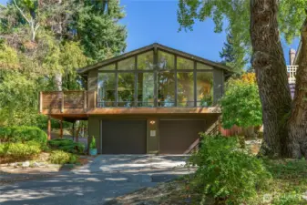 Sanctuary on Queen Anne’s west slope, where treetop privacy meets Puget Sound views—just blocks from village cafés, markets, and neighborhood staples like Macrina Bakery, Ken’s Market, Good Society Brewery, Trader Joe’s, Metropolitan Market, and Whole Foods.