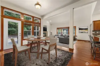 Virtually staged kitchen eating area and family room