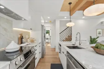 Kitchen, looking towards the downstairs 4th bedroom/office.