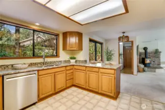 This heart of the home flows into sliders to the deck, large/flexible family room/space, and mudroom to the large double car garage.