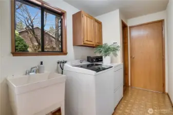 Swoon for this mudroom off of the garage!  Extra storage and place to store shoes and backpacks.