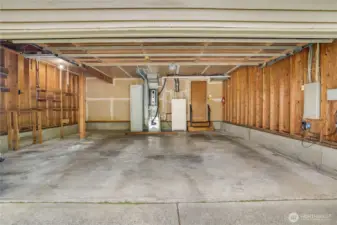Very roomy 2-car garage allows you more storage and room for your larger vehicles.