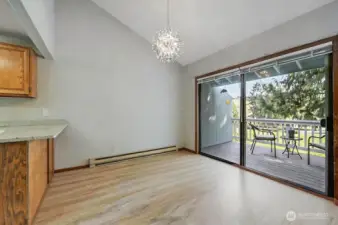 The view overlooking the 9th fairway is alway well-kept, and it's a wonderful place to enjoy nature, sunrises, sunshine, and to just relax. And, here's the dining area so you can envision creating it for your own space.