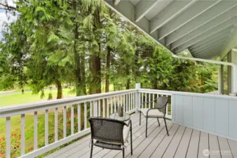 Here's your partially covered, weather-resistant deck with a beautiful view of the golf course and native Cedar trees.