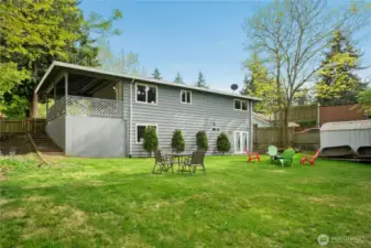 Steps to upper level on side of house.