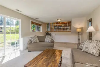 Family room on the lower level has a slider to the back yard