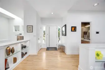 The front entry says it all:  Quality, classy, efficient, perfection. The wall niches add architectural interest and can showcase your treasured artwork, statues, pottery, books, and more.
