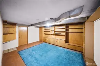 Lower level finished space to demo and open the floor plan