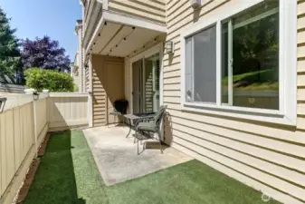 Oversized patio with turf for no maintenance!