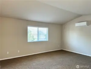 Vaulted Ceiling in primary adds to the open and grand feel of the home.