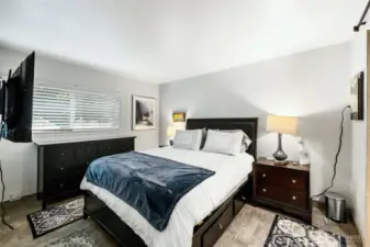 Tranquil primary suite offers respite at the end of the day.