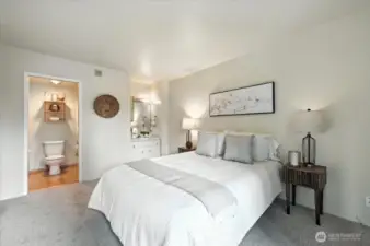 Private bath adjacent to primary bedroom.
