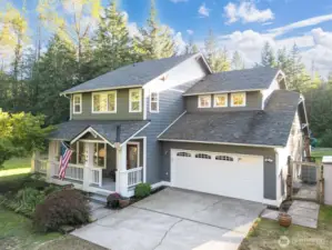 Tucked at the end of a tree-lined drive, this home feels like something out of a storybook. 4.77 acres of forest, trails, and open lawn set the scene for slow mornings, peaceful evenings, and a lifestyle that invites you to stay awhile.