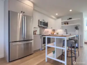 Modern kitchen with stainless backsplash