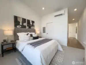 Bedroom flows into attached walk-in closet