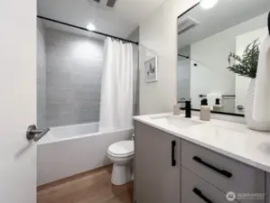 Similarly appointed downstairs bath