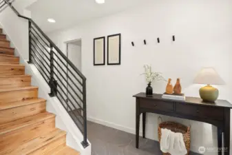 Entry hallway leading to additional bedrooms & backyard access
