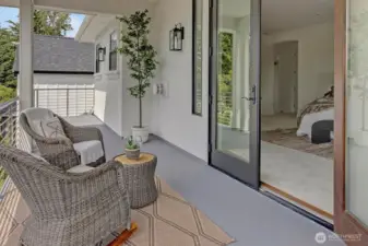 An extension of the owner's suite,   this elegant deck offers a serene space for morning coffee, fresh air and peaceful moments.