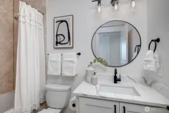 Secondary bedrooms feature designer carpet, large picture windows and modern bathrooms!