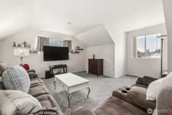 This bonus room could easily be a 4th bedroom.