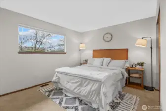 Primary bedroom featuring freshly repainted walls.