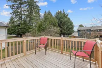 Newly built cedar deck featuring views of the lake.