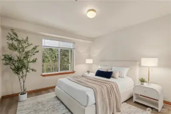 Primary ensuite bedroom with walk in closet