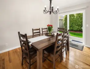 The circular floor-plan offers ideal living w/sliders to the beautiful patio and fully fenced yard.
