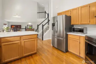Warm hardwoods, quartz counter-tops and a full SS appliance package too! This home is perfect!