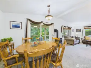 The dining area has room for a large table and is conveniently located between the outside and inside entertaining areas.