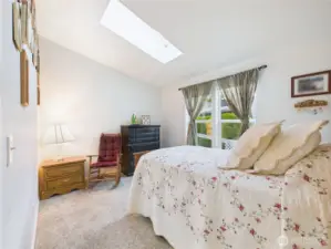 Bedroom #1. Light and bright with the skylight letting in natural light.