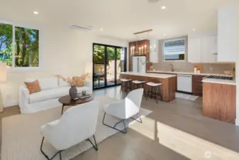 Main living area has a recessed minisplit and the sliding "wall" opens out onto a patio and level, fully fenced back yard.