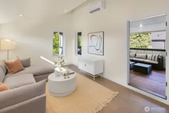 This shows the access to the covered deck area from the family room on the top level of the home.