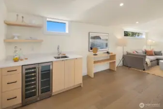 The top level of the home has a family room, wetbar, covered deck, full bath and a 4th bedroom.